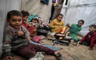 children sleeping helpless amid Gaza raid